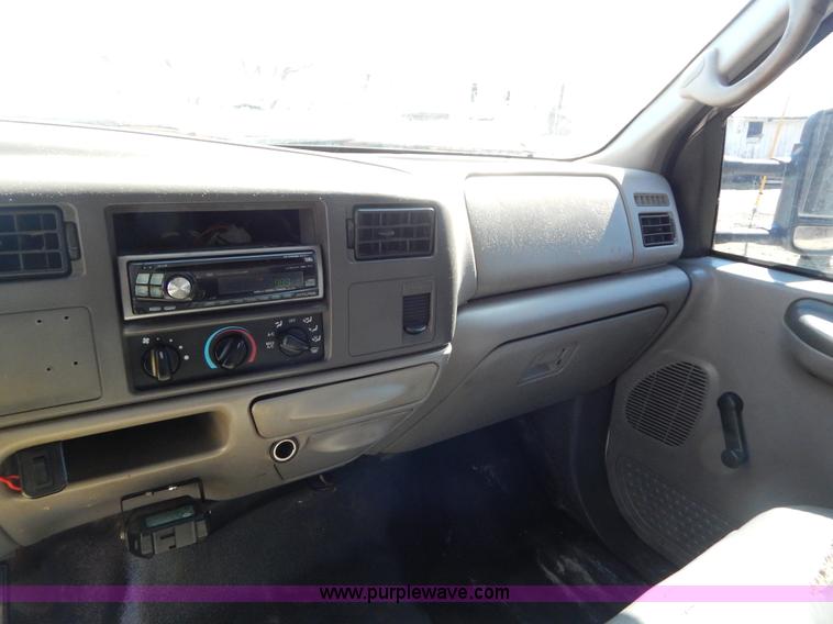 image for item I1117 1999 Ford F450 flatbed truck