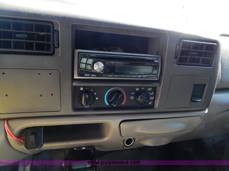 image for item I1117 1999 Ford F450 flatbed truck