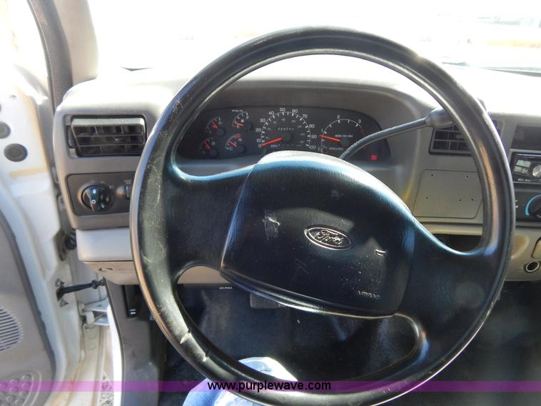 image for item I1117 1999 Ford F450 flatbed truck