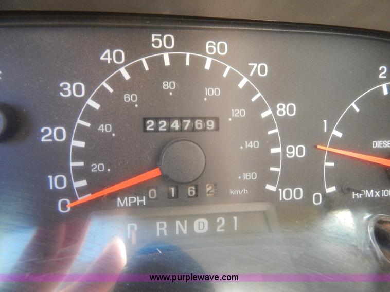 image for item I1117 1999 Ford F450 flatbed truck