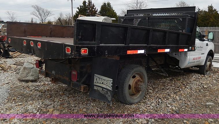 image for item I3708 2002 Ford F450 Super Duty XL flatbed pickup truck