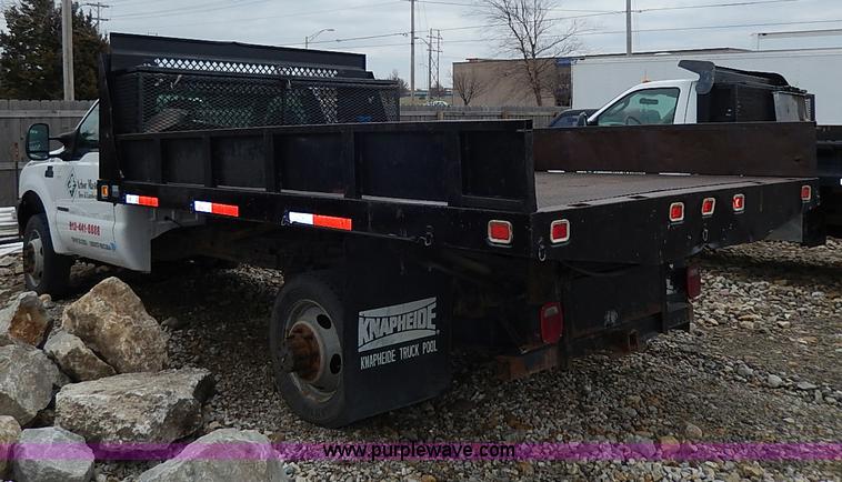 image for item I3708 2002 Ford F450 Super Duty XL flatbed pickup truck