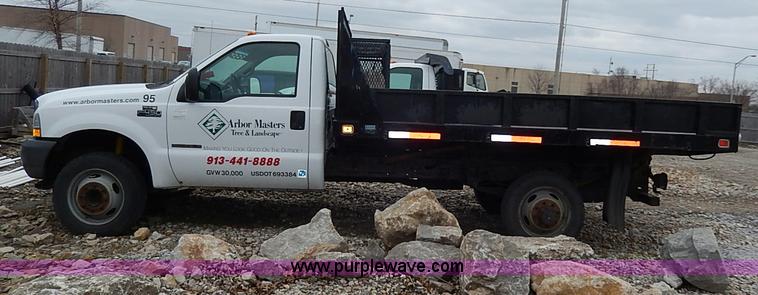 image for item I3708 2002 Ford F450 Super Duty XL flatbed pickup truck