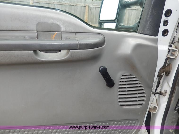 image for item I3708 2002 Ford F450 Super Duty XL flatbed pickup truck