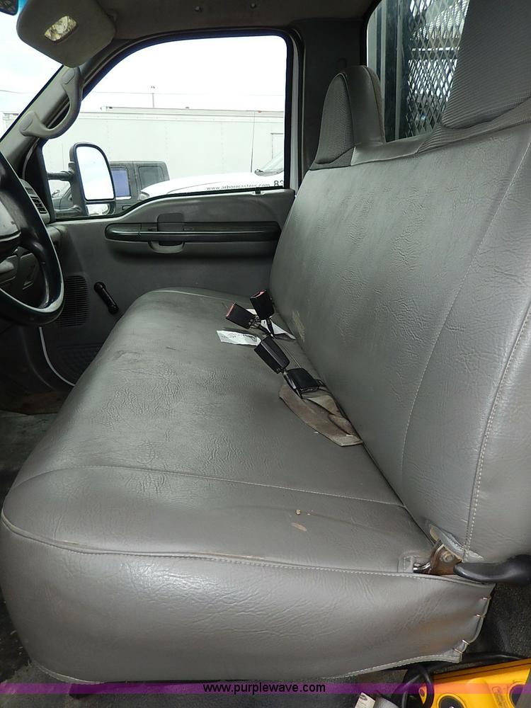 image for item I3708 2002 Ford F450 Super Duty XL flatbed pickup truck