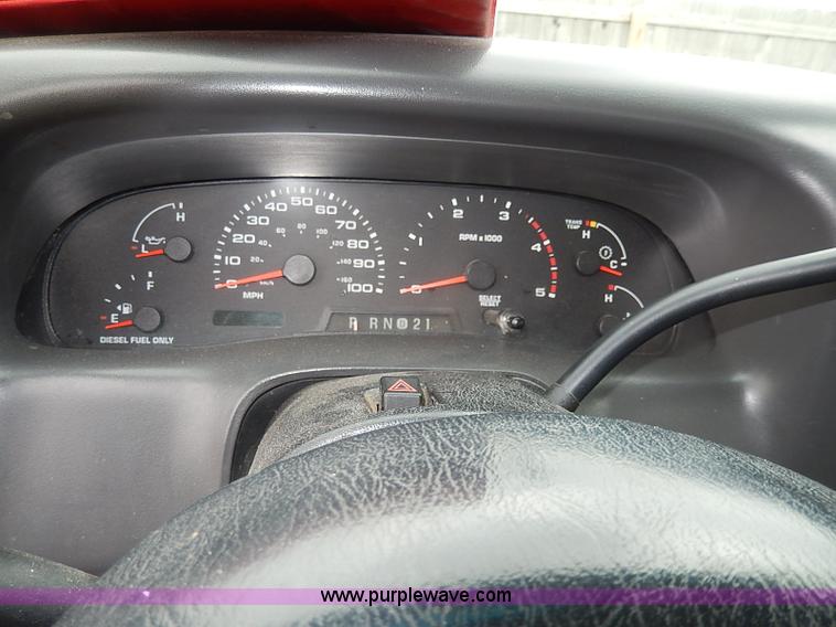 image for item I3708 2002 Ford F450 Super Duty XL flatbed pickup truck