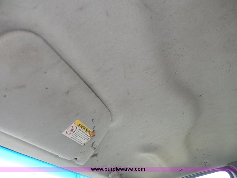 image for item I3708 2002 Ford F450 Super Duty XL flatbed pickup truck