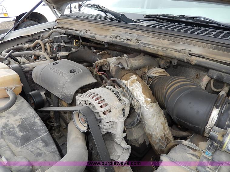 image for item I3708 2002 Ford F450 Super Duty XL flatbed pickup truck