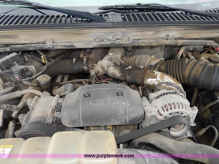 image for item I3708 2002 Ford F450 Super Duty XL flatbed pickup truck