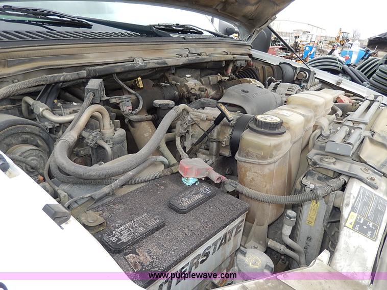 image for item I3708 2002 Ford F450 Super Duty XL flatbed pickup truck