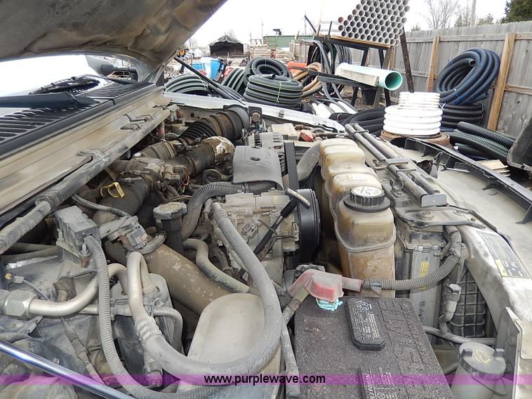 image for item I3708 2002 Ford F450 Super Duty XL flatbed pickup truck