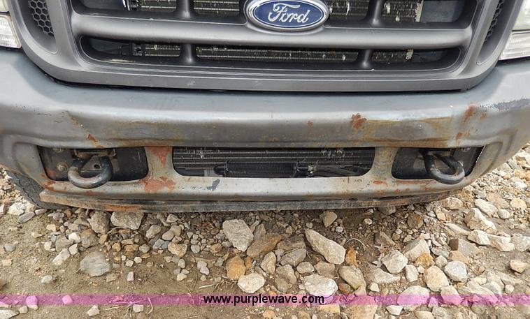 image for item I3708 2002 Ford F450 Super Duty XL flatbed pickup truck