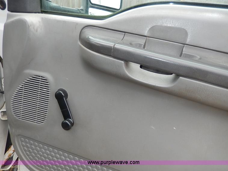 image for item I3708 2002 Ford F450 Super Duty XL flatbed pickup truck