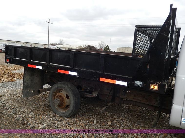 image for item I3708 2002 Ford F450 Super Duty XL flatbed pickup truck