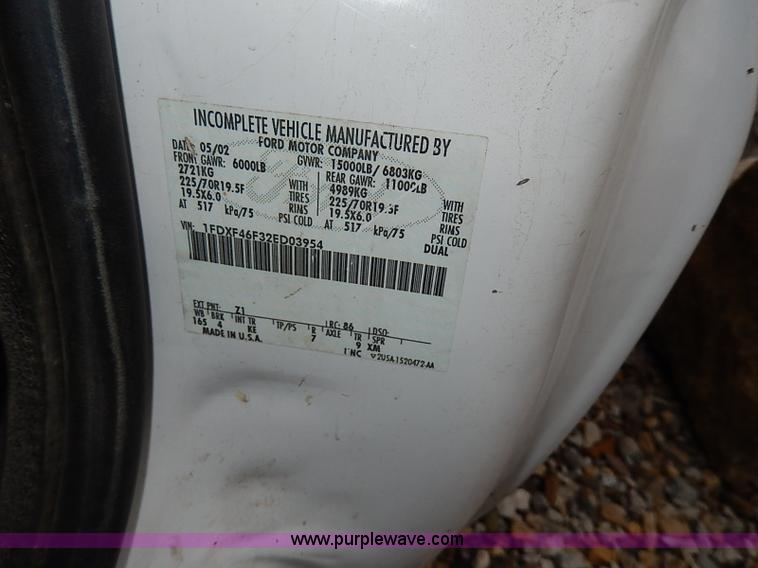 image for item I3708 2002 Ford F450 Super Duty XL flatbed pickup truck