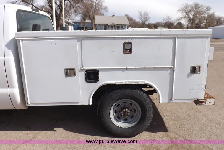 image for item I9007 1999 Ford F250 Super Duty SuperCab utility truck