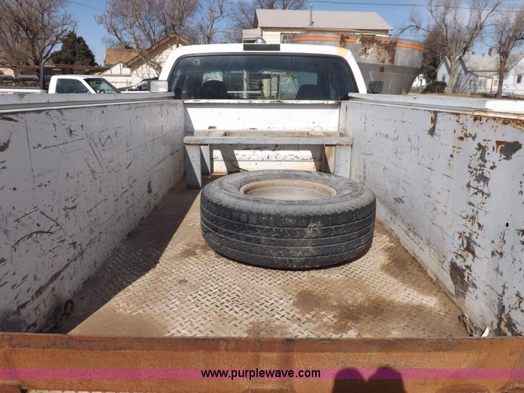 image for item I9007 1999 Ford F250 Super Duty SuperCab utility truck