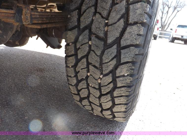 image for item I9007 1999 Ford F250 Super Duty SuperCab utility truck