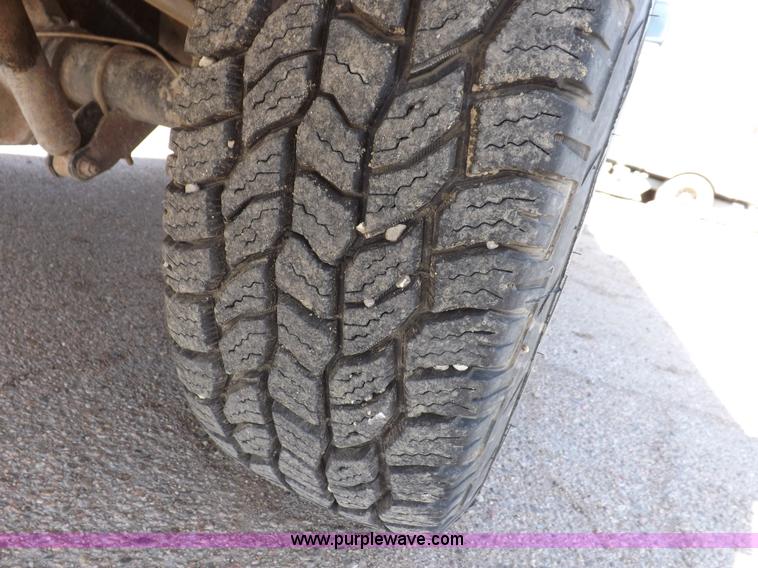 image for item I9007 1999 Ford F250 Super Duty SuperCab utility truck