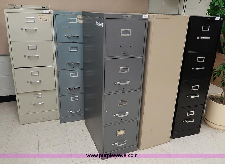 image for item AC9179 (8) four drawer metal filing cabinets