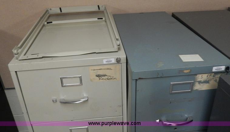 image for item AC9179 (8) four drawer metal filing cabinets