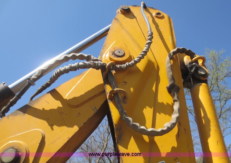 image for item F6892 John Deere 310D backhoe