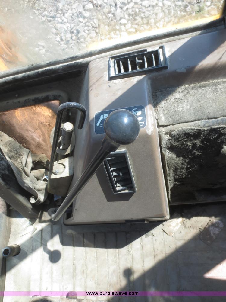 image for item F6892 John Deere 310D backhoe