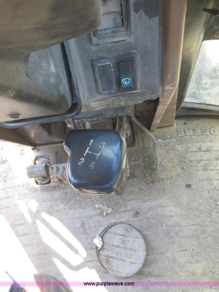 image for item F6892 John Deere 310D backhoe