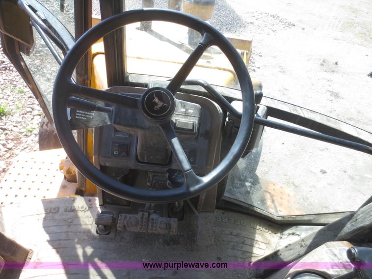 image for item F6892 John Deere 310D backhoe