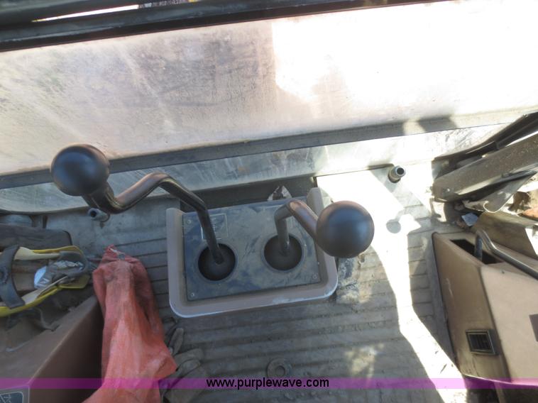 image for item F6892 John Deere 310D backhoe