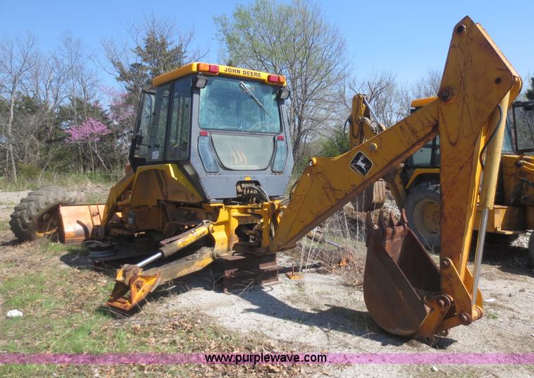 image for item F6893 John Deere 310C backhoe