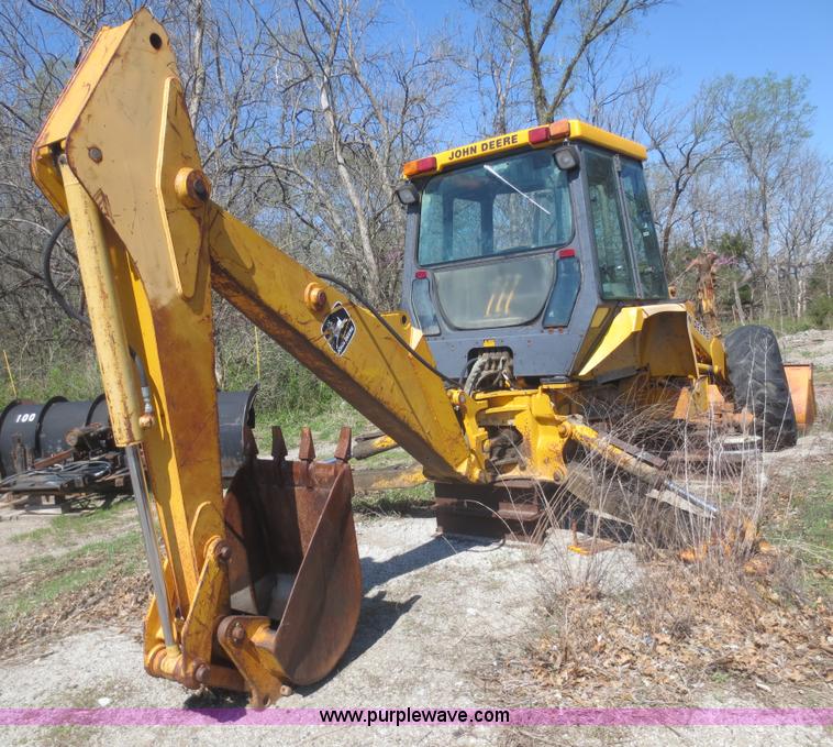 image for item F6893 John Deere 310C backhoe
