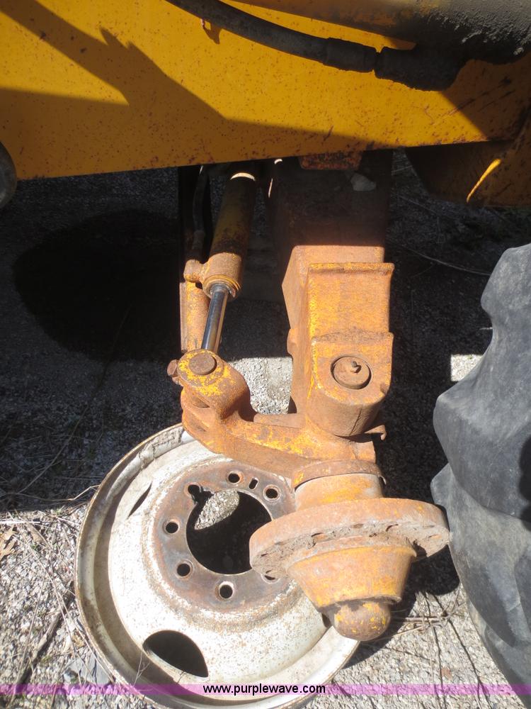 image for item F6893 John Deere 310C backhoe