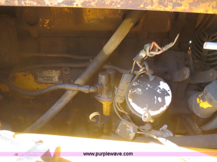 image for item F6893 John Deere 310C backhoe