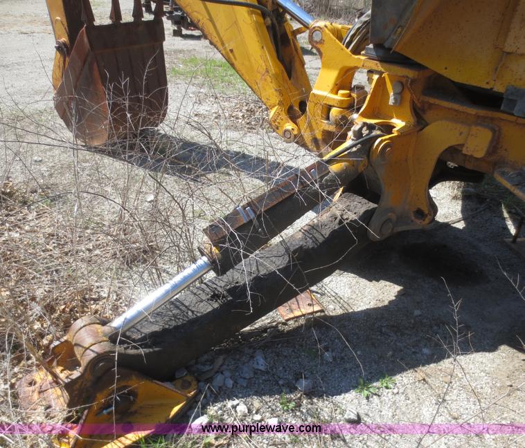 image for item F6893 John Deere 310C backhoe