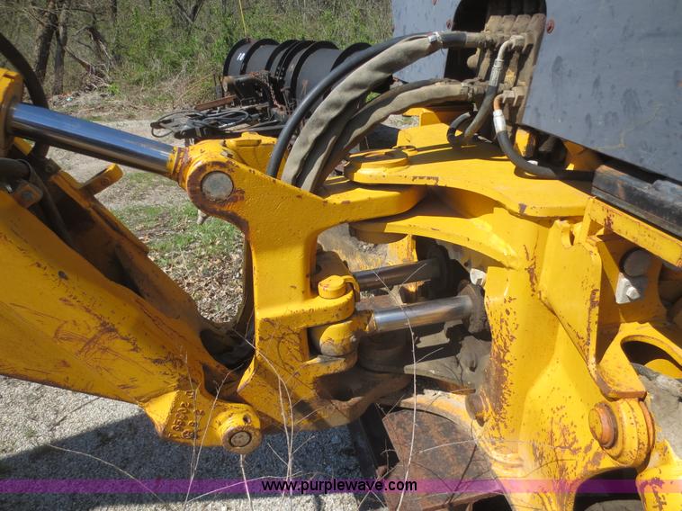 image for item F6893 John Deere 310C backhoe