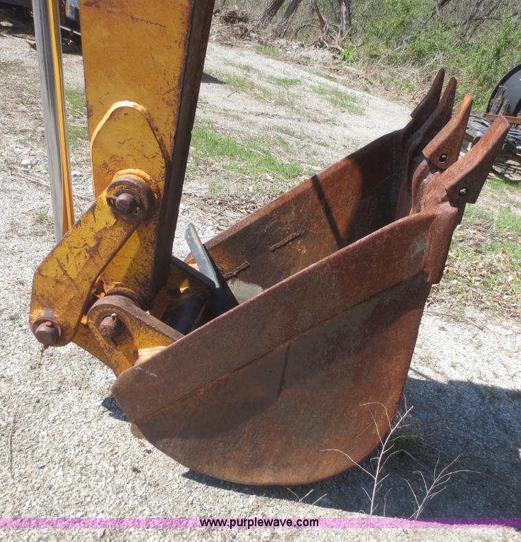 image for item F6893 John Deere 310C backhoe