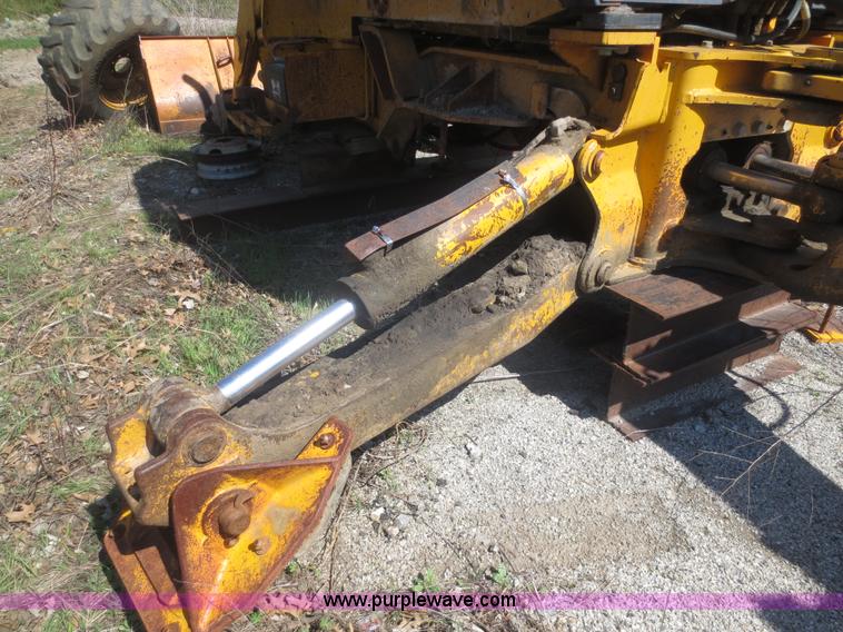 image for item F6893 John Deere 310C backhoe