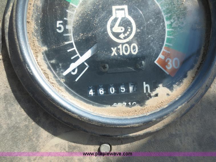 image for item F6893 John Deere 310C backhoe