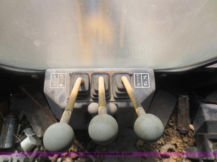 image for item F6893 John Deere 310C backhoe