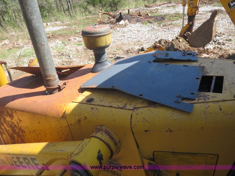 image for item F6893 John Deere 310C backhoe