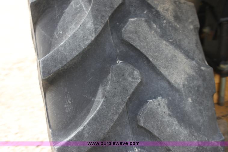 image for item H2184 New Holland TS110 tractor