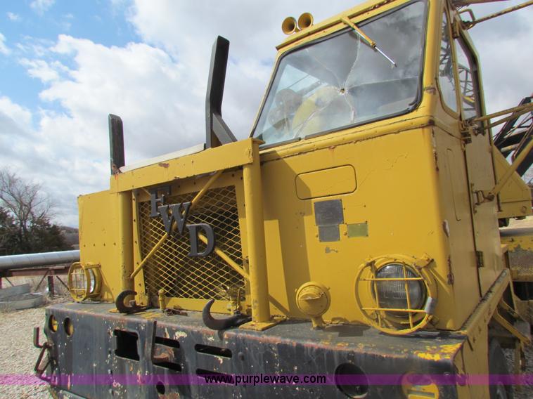 image for item H2222 FWD MUC6X6 truck with Garwood 20 ton crane