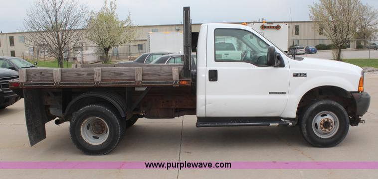 image for item H6015 2001 Ford F350 Super Duty XL flatbed truck