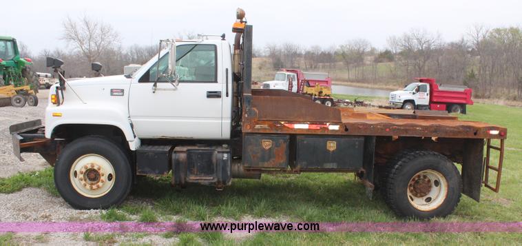 image for item H6062 2000 GMC C8500 flatbed truck