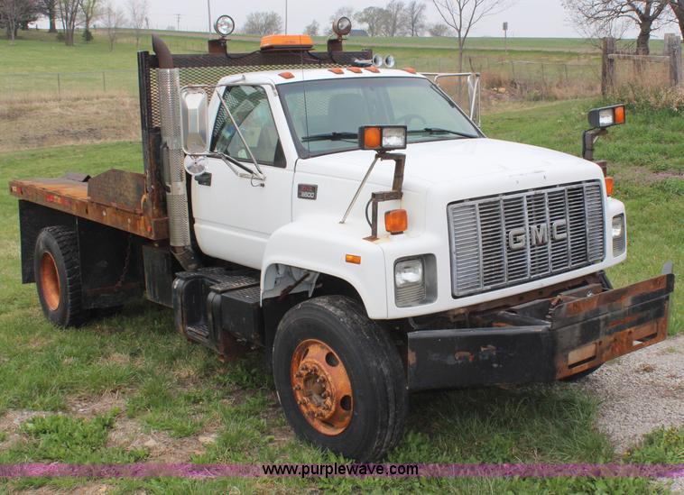 image for item H6062 2000 GMC C8500 flatbed truck