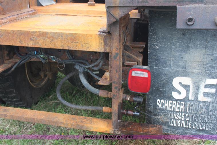 image for item H6062 2000 GMC C8500 flatbed truck