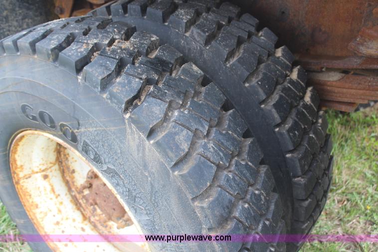 image for item H6062 2000 GMC C8500 flatbed truck