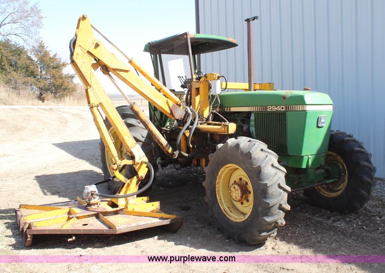 image for item H6218 1980 John Deere 2940 MFWD tractor with boom mower