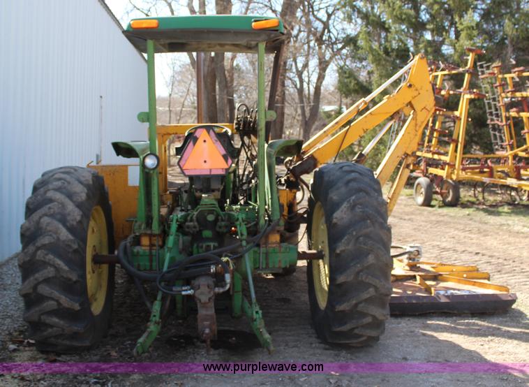 image for item H6218 1980 John Deere 2940 MFWD tractor with boom mower